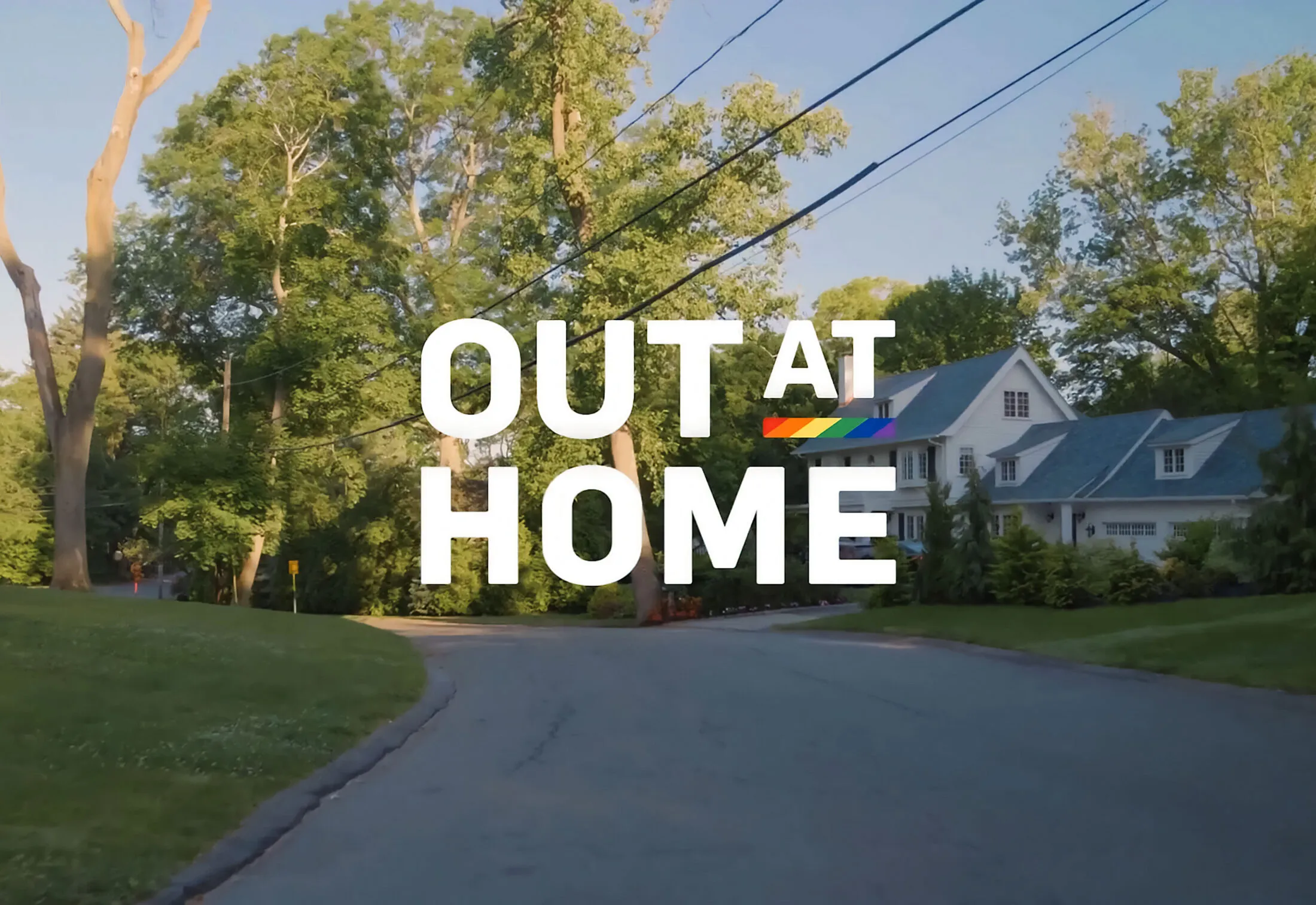 Out at Home text overlayed on a suburban street with a house and trees.