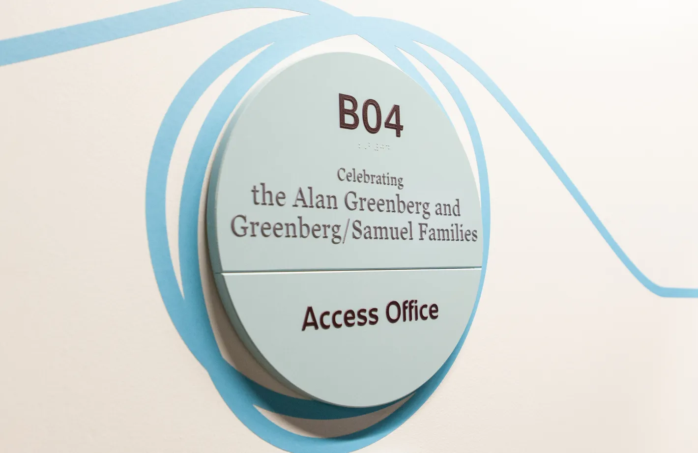 Sign for B04 Access Office celebrating the Alan Greenberg and Greenberg/Samuel Families.