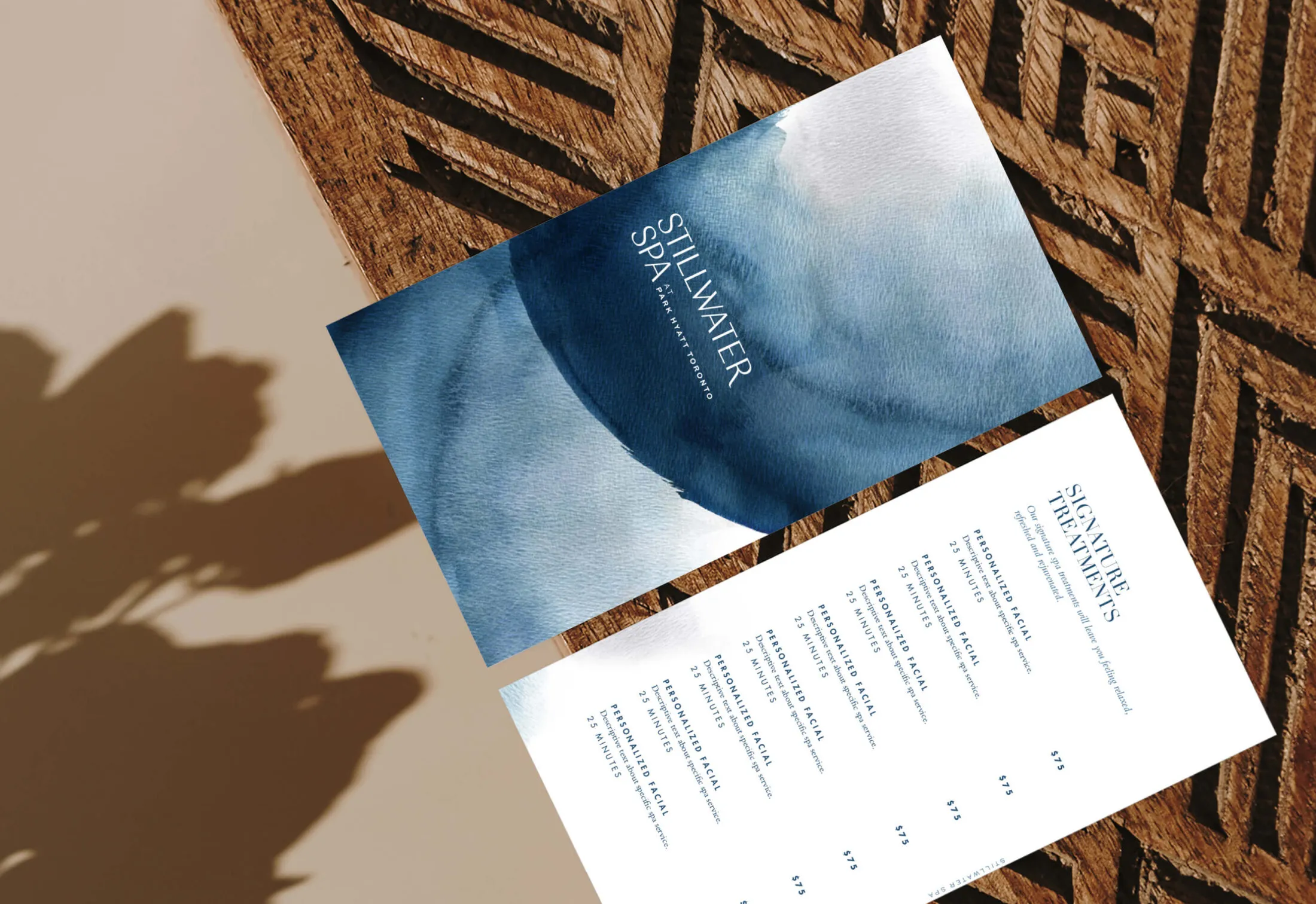 Stillwater Spa menu with watercolour design and signature treatments.