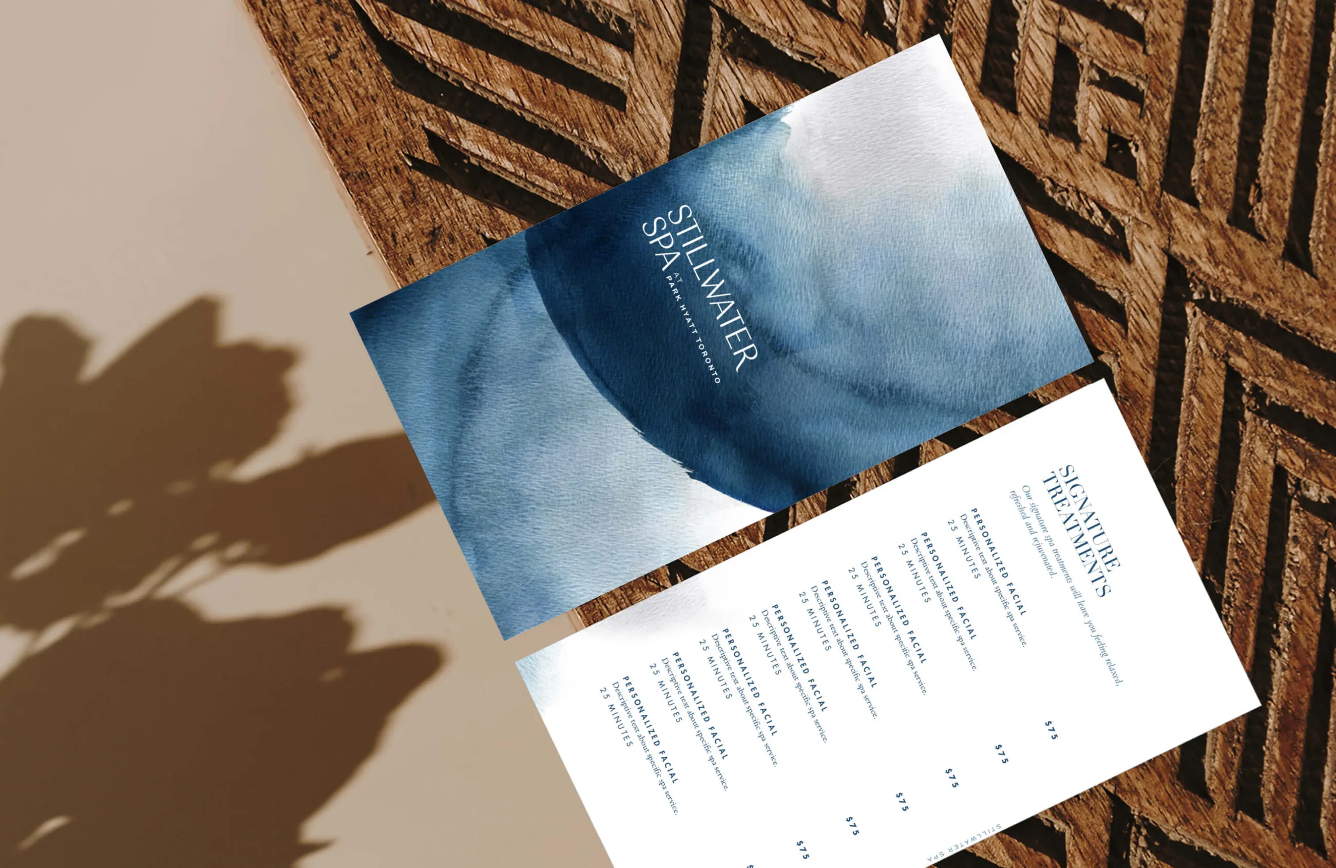 Stillwater Spa menu with watercolour design and signature treatments.