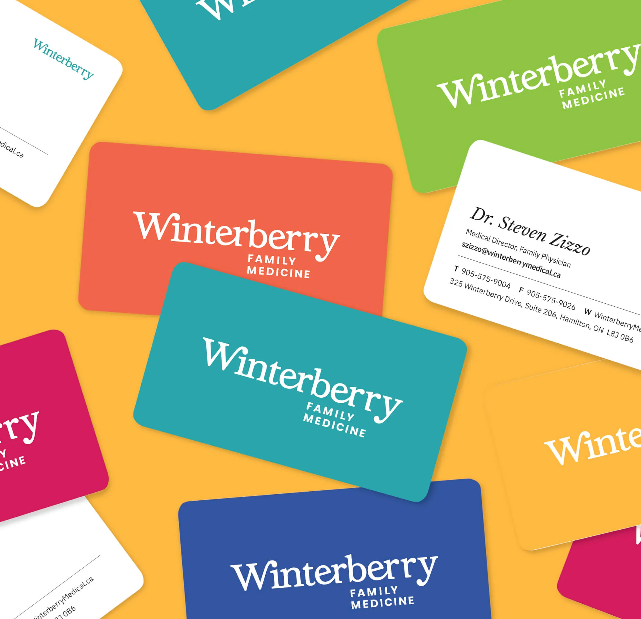Business cards for Winterberry Family Medicine in various colours.