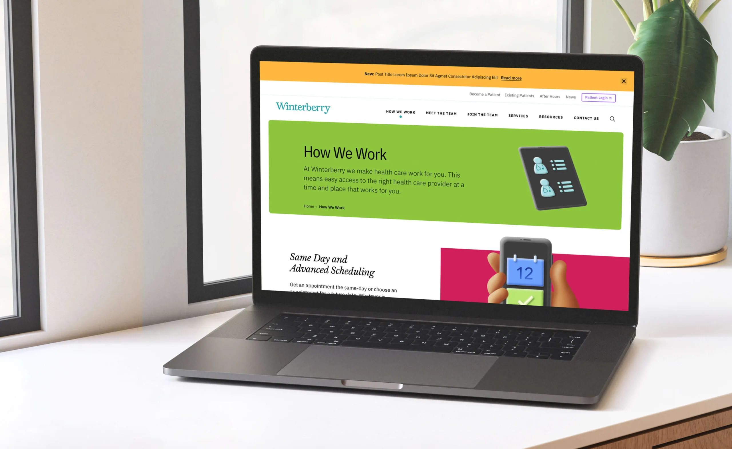 Laptop displaying the Winterberry website with 