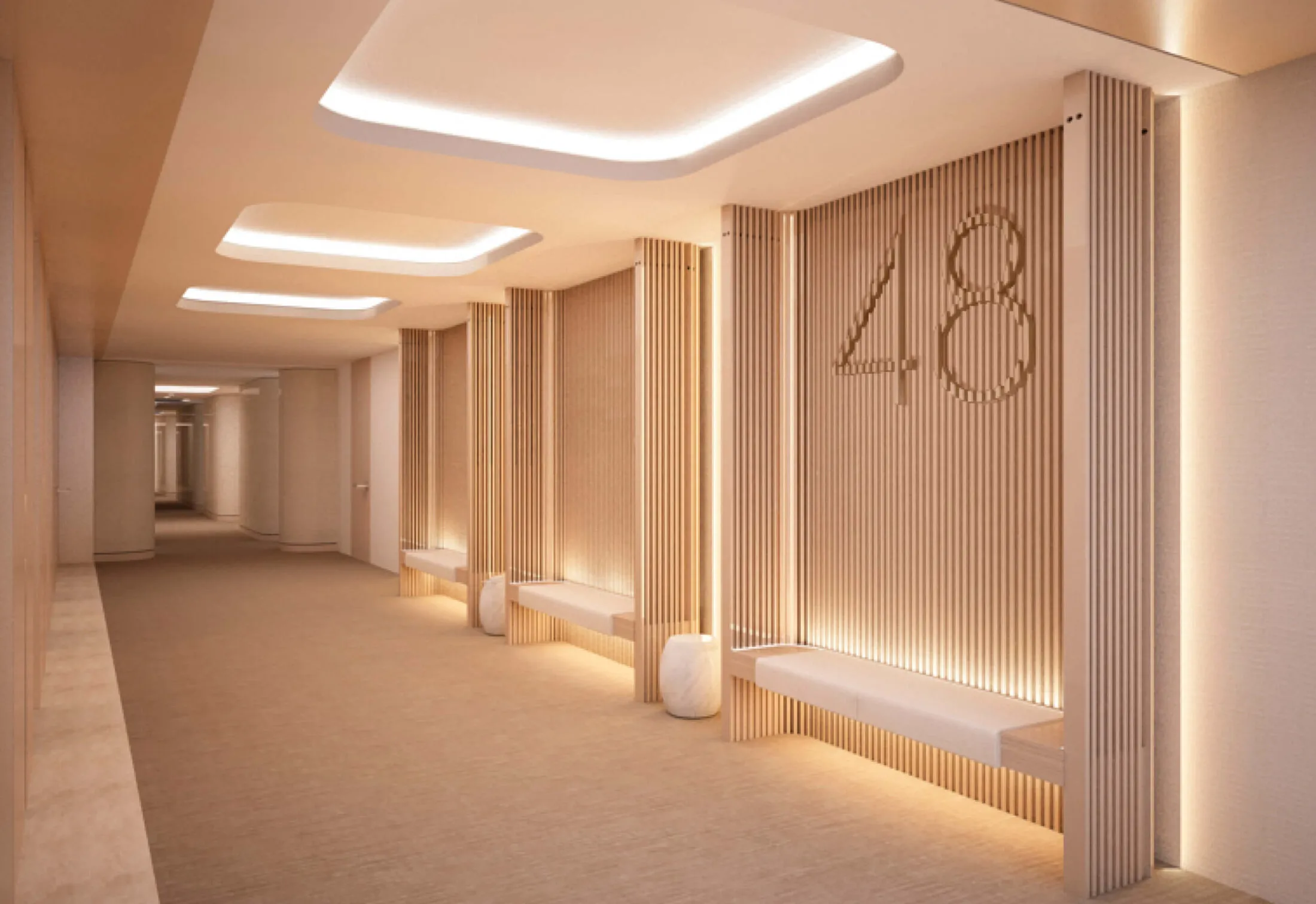 Modern hallway with wood paneling, benches, and illuminated ceiling features.