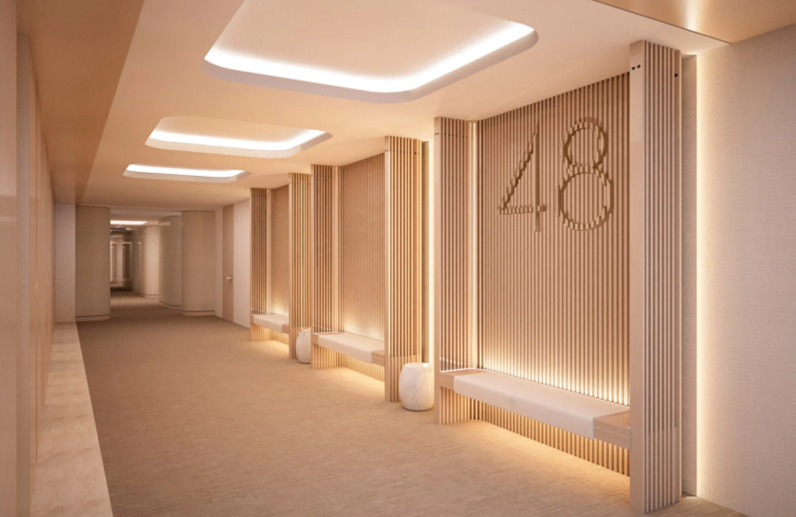 Modern hallway with wood paneling, benches, and illuminated ceiling features.