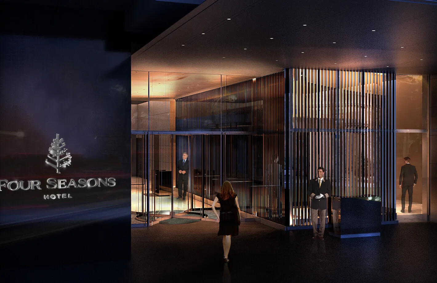 Four Seasons Hotel Philadelphia entrance with doorman and revolving doors.