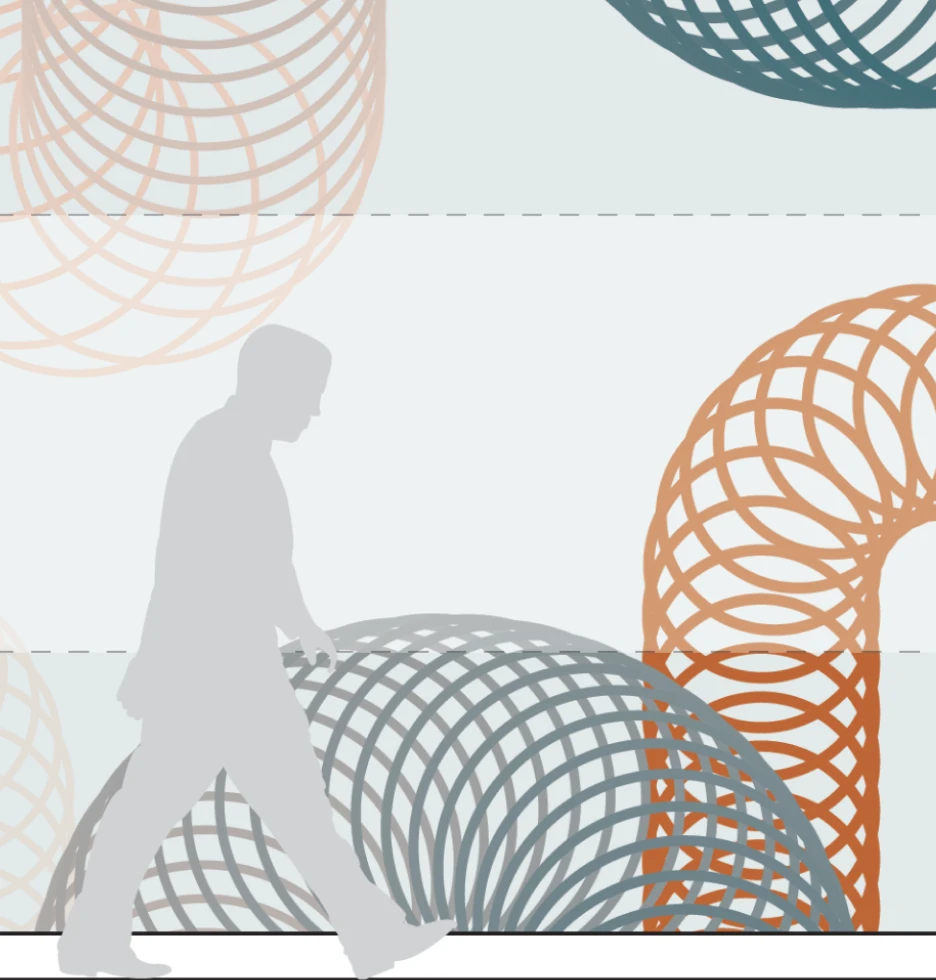 Silhouette of a person walking past abstract, colourful, coiled structures.